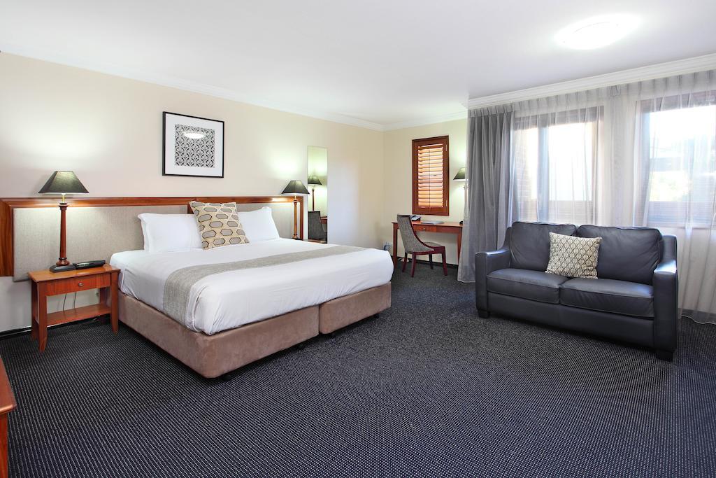 Ramada By Wyndham Brisbane Windsor Hotell Rom bilde